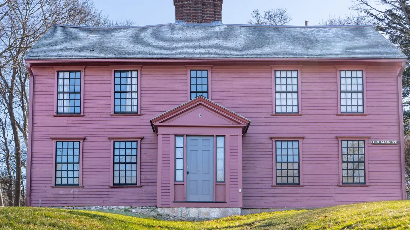 Antique pink clapboard colonial house on Main Street in Sandwich, Massachusetts
