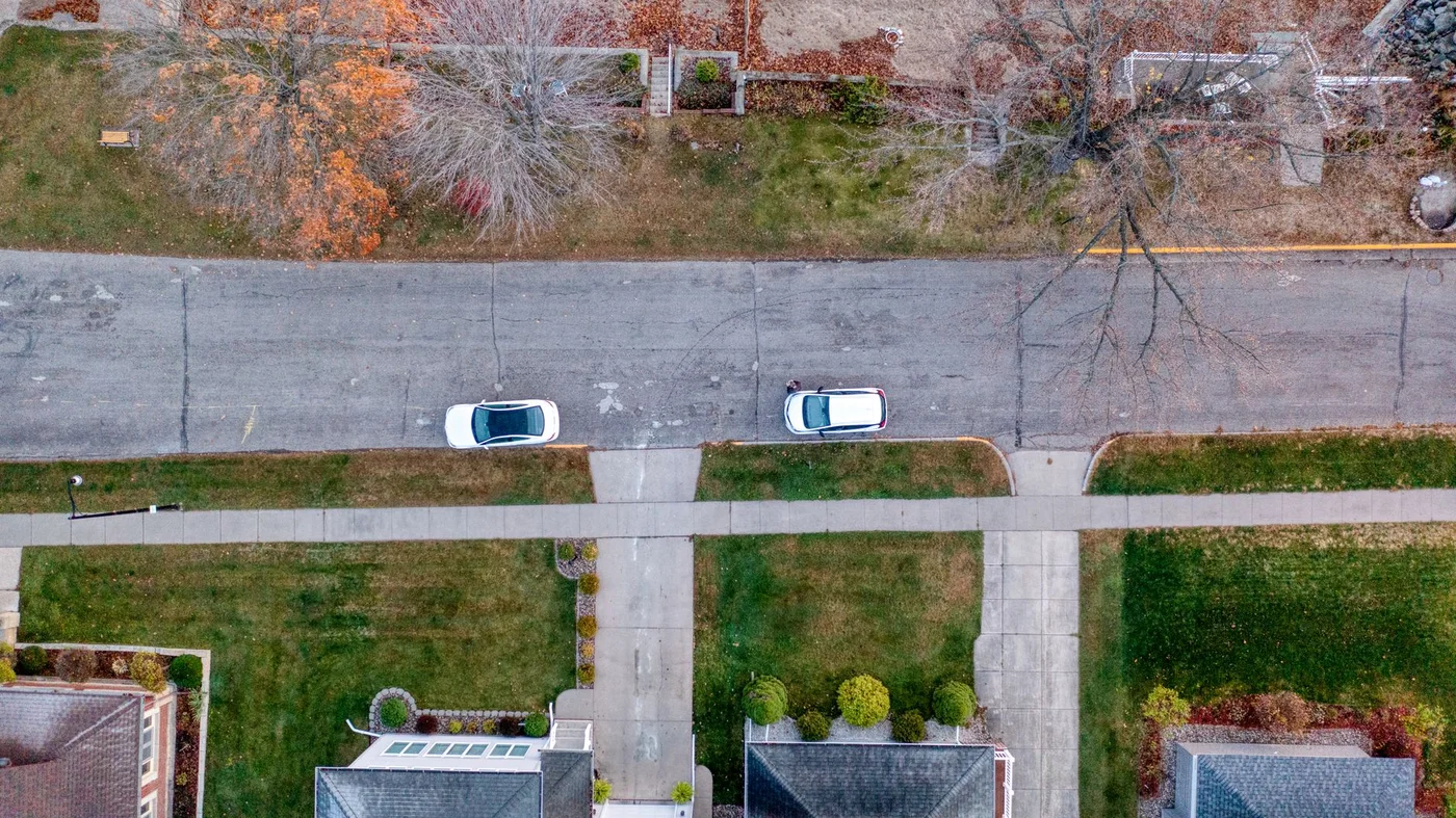 Overhead aerial view of houses, lawns and a residential street in Wabasha, Minnesota