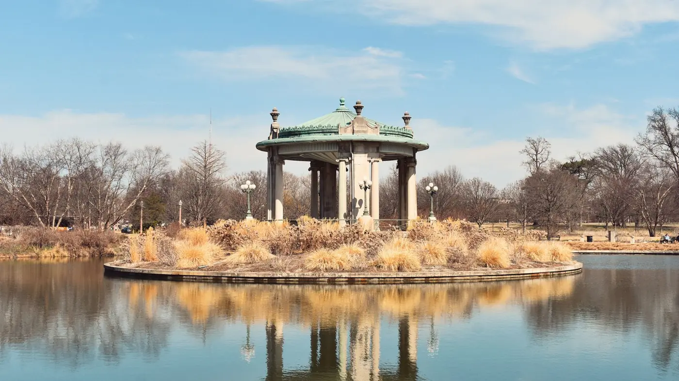 The Nathan Frank Bandstand on its island in Forest Park, St. Louis, reflected in the lake